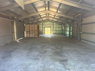 5 Acres with Large Shed House